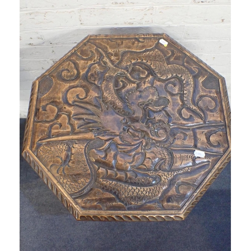 809 - A JAPANESE OCTAGONAL TABLE, OF LIBERTY & Co TYPE with typical carved decoration and under tier, the ... 