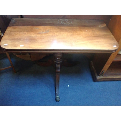 810 - A 19TH CENTURY MAHOGANY TEA TABLE on tripod base with lion paw brass terminals 94cm wide