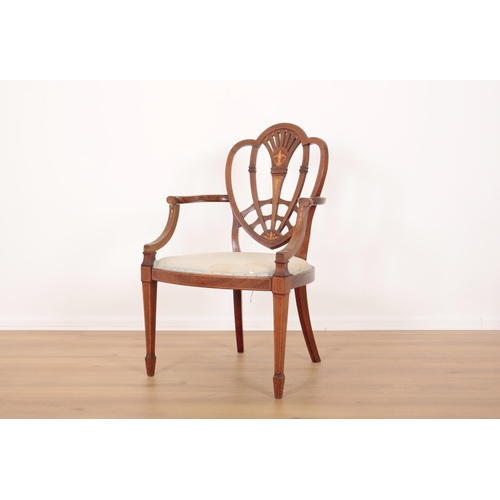 12 - A PAIR OF EDWARDIAN MAHOGANY ARMCHAIRS IN HEPPLEWHITE STYLE

with satinwood inlays of classical deco... 