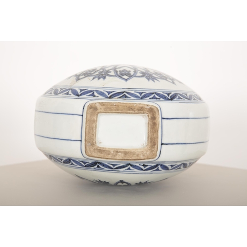 18 - A CHINESE BLUE AND WHITE FLASK

of double-gourd shape with applied strap handles, decorated with lar... 