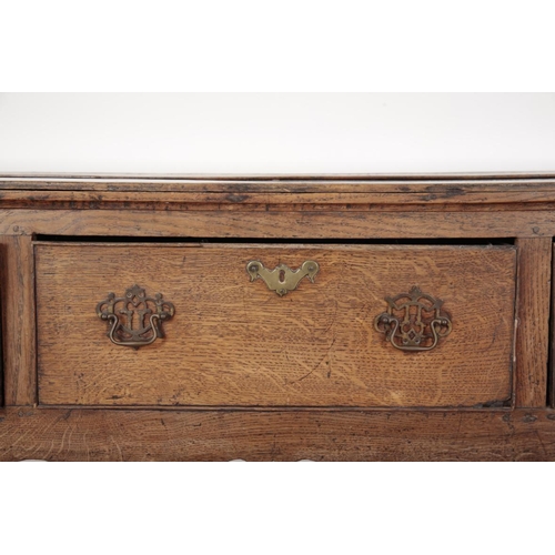 21 - AN OAK DRESSER

18th century and later, the plate rack with moulded cornice over a shaped frieze, fi... 