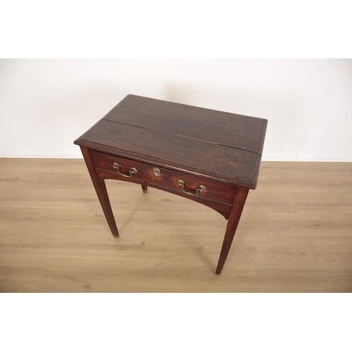 24 - A MAHOGANY SIDE TABLE

19th century, with a single frieze drawer, on tapered block legs, 80cm high x... 