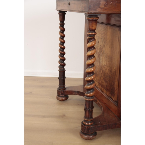 7 - A VICTORIAN WALNUT DAVENPORT

with pierced gallery and tooled leather writing slope enclosing a fitt... 