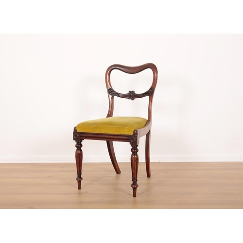 107 - A SET OF SIX EARLY VICTORIAN GRAINED ROSEWOOD DINING CHAIRS

the kidney shaped backs with carved spl... 