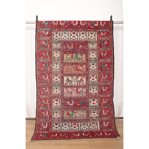 112 - A NORTH EAST PERSIAN SILK SUMAK RUG

decorated with stylised birds throughout, 185cm x 115cm