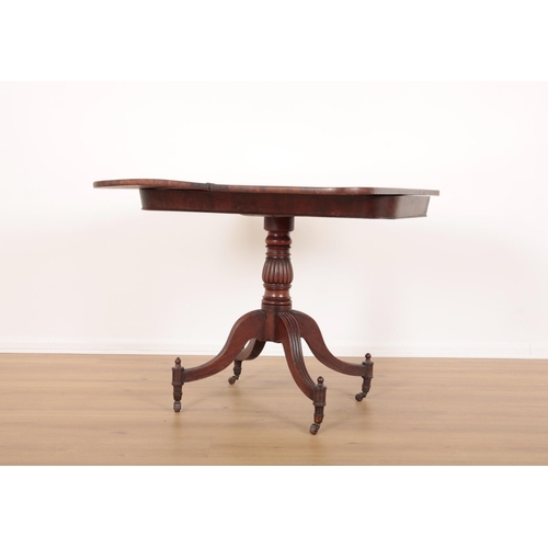 113 - A MAHOGANY TEA TABLE

early 19th century, the crossbanded top opening to a conforming interior, on t... 