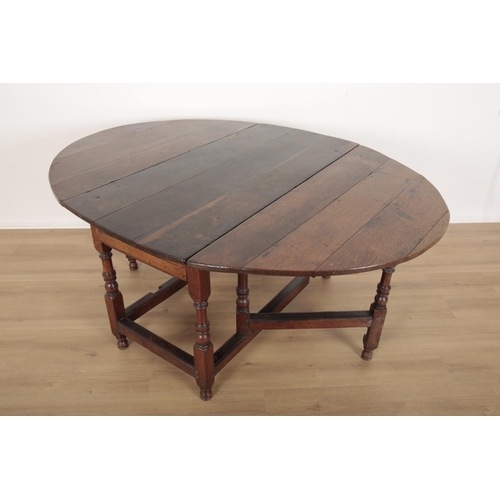 117 - AN OAK DROP-LEAF TABLE

early 18th century, with an oval top over a single frieze drawer, on turned ... 