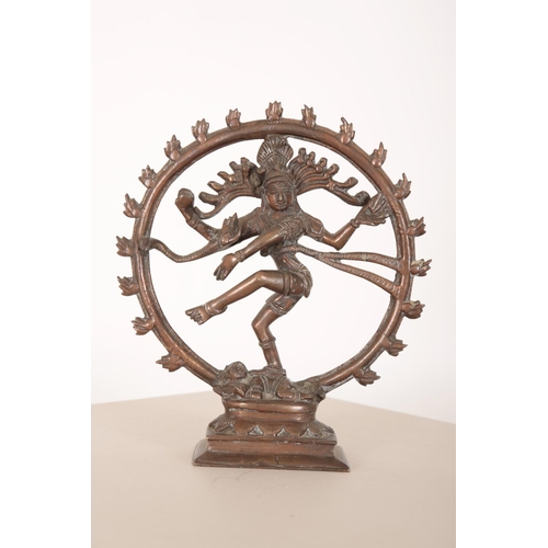 124 - AN INDIAN BRONZE FIGURE OF SHIVA

depicted standing in a roundel, 20cm high x 18cm diameter