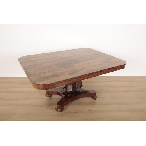 133 - AN EARLY VICTORIAN ROSEWOOD BREAKFAST TABLE

the rectangular top with rounded corners on panelled ce... 