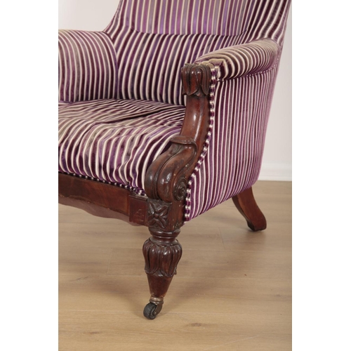 145 - A VICTORIAN MAHOGANY ARMCHAIR

with cut velvet covers, the spoon back above wide-spread arms, one mo... 