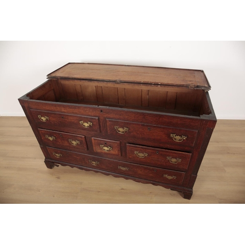 155 - AN OAK AND APPLEWOOD BANDED LANCASHIRE CHEST

mid 18th century, the hinged top opening to a vacant i... 