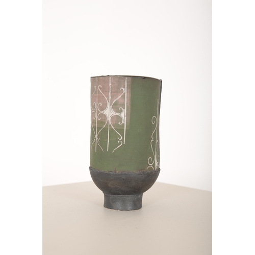 162 - *SARAH DUNSTAN (b. 1969) FOR GAOLYARD STUDIOS: A GREEN JUG

the body with overlaid porcelain decorat... 