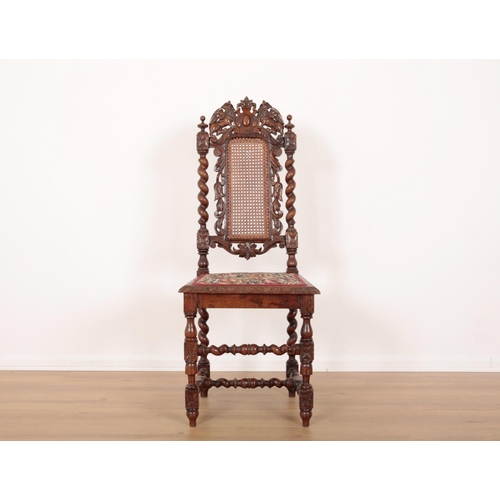 163 - A PAIR OF CARVED OAK SIDE CHAIRS IN CAROLEAN STYLE

with carved cresting rails surmounted by griffon... 