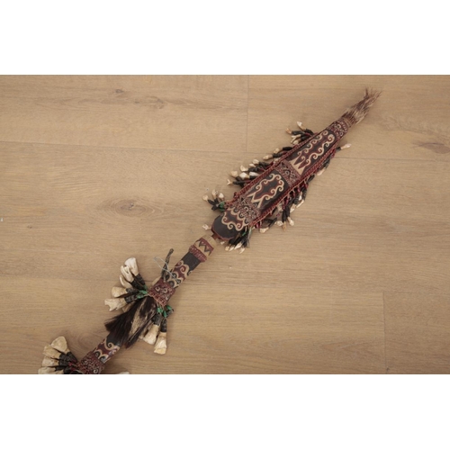 165 - A COLLECTION OF TRIBAL ART

including an iron Mangbetu sickle knife (trumbash), 39cm long, a Dayak w... 