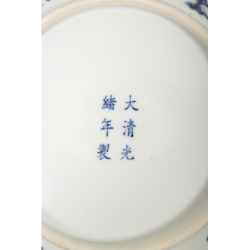 181 - A CHINESE BLUE AND WHITE DRAGON DISH

decorated with five-claw dragons contesting flaming pearls ami... 