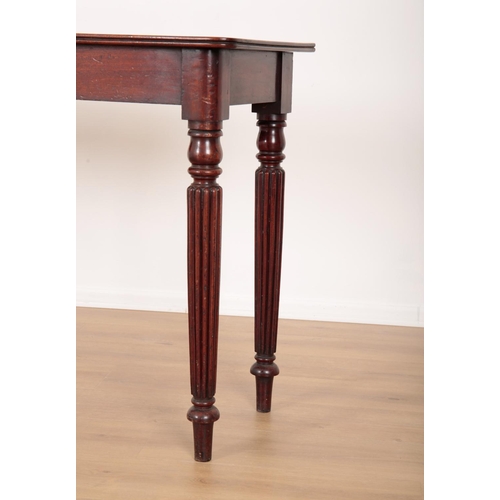 187 - A MAHOGANY SIDE TABLE

19th century, with rounded corners and straight reeded legs, 81cm high x 147c... 