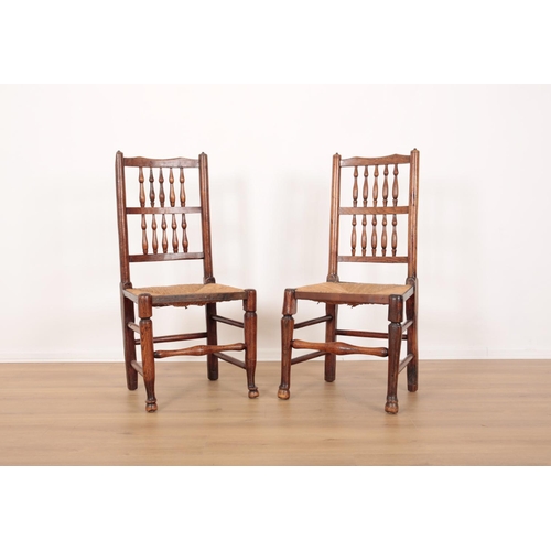 193 - AN ASSOCIATED SET OF SIX FARMHOUSE CHAIRS

each with spindle backs over square rush seats, on turned... 