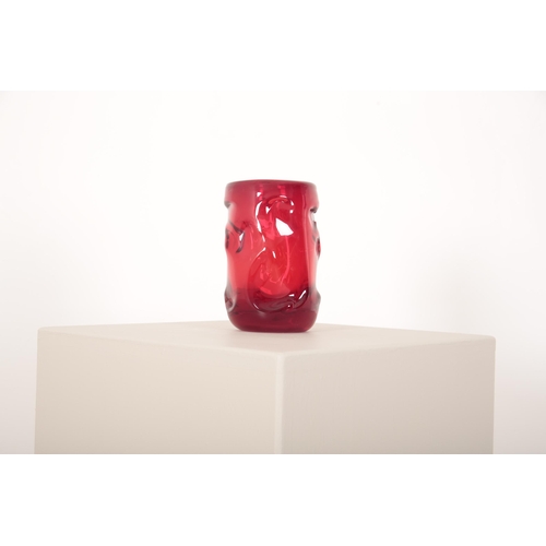 208 - A WHITEFRIARS RUBY RED GLASS KNOBBLY VASE

19cm high x 11cm diameter and a smaller ditto, 13cm high ... 