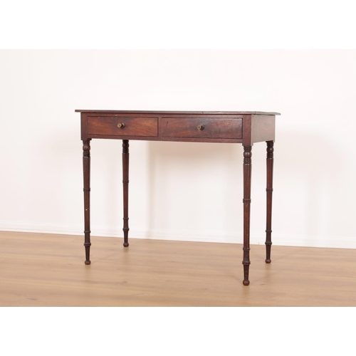 213 - AN EARLY VICTORIAN MAHOGANY SIDE TABLE

fitted two drawers, on slender ring turned legs, 78.5cm high... 