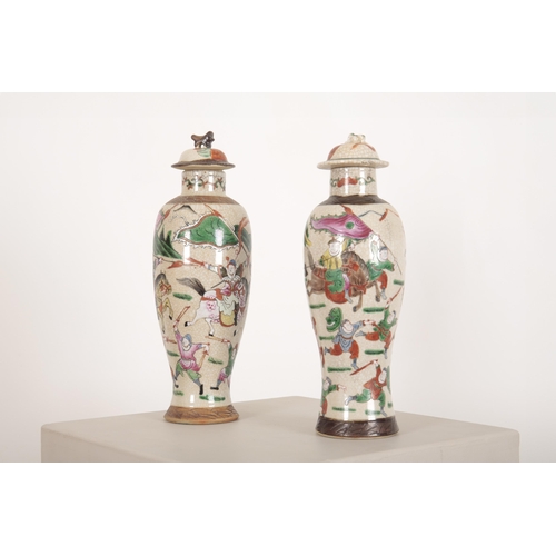 216 - TWO CHINESE FAMILLE VERTE CRACKLEWARE PORCELAIN BALUSTER SHAPED VASES

early 20th Century, decorated... 