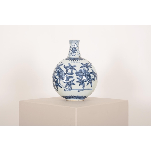 227 - A CHINESE BLUE AND WHITE MOON FLASK

decorated with stylised peonies and tendrils, with six characte... 