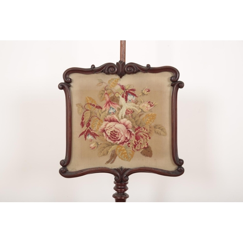 245 - A VICTORIAN MAHOGANY POLE SCREEN

with an embroidered floral panel, 158cm high to the top of the pol... 