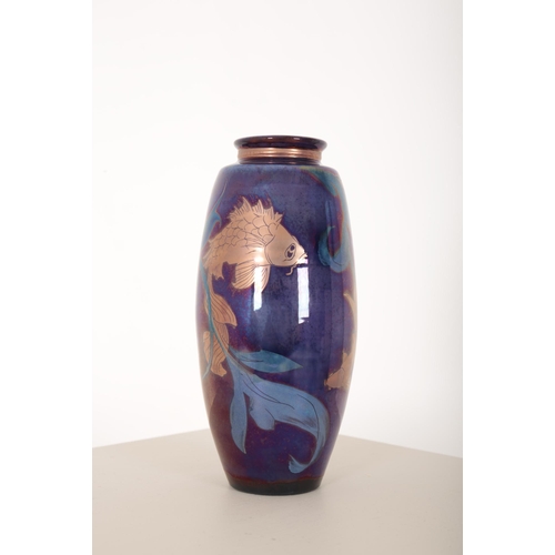 260 - *JONATHAN CHISWELL JONES (b. 1944) FOR JCJ POTTERY: A REDUCTION FIRED LUSTRE VASE

of compressed bal... 