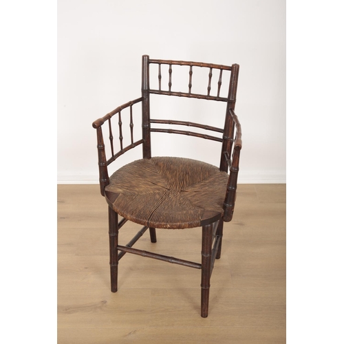 38 - A STAINED BEECHWOOD SUSSEX CHAIR ATTRIBUTABLE TO FORD MADDOX BROWN

19th century, of bamboo design w... 