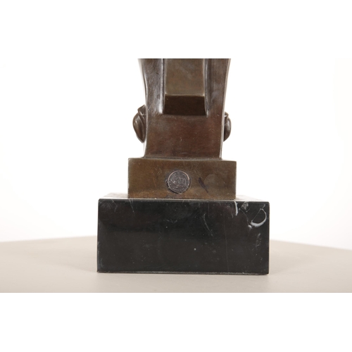 42 - AN ART DECO STYLE STYLISED BRONZE OWL ON BLACK MARBLE PLINTH

21st century, perched on two bronze st... 