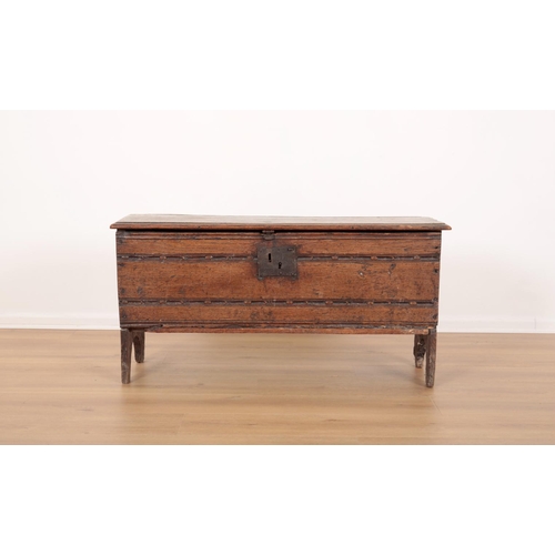 67 - AN OAK SIX PLANK COFFER

17th century, the hinged lid opening to a vacant interior, the front panel ... 