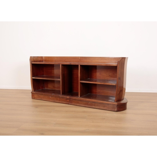 75 - AN 'ART DECO' ROSEWOOD BOOKCASE

mid-century, the top with a three-quarter gallery, the sides shaped... 