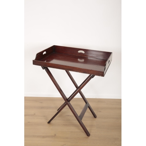 78 - A MAHOGANY BUTLERS TRAY ON FOLDING STAND

19th century, with three-handled rectangular tray, with cr... 