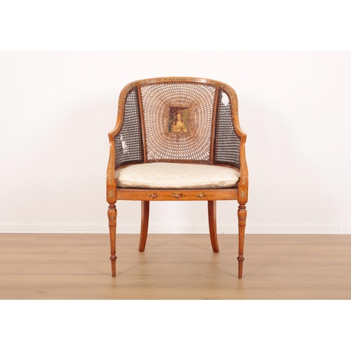 90 - AN EDWARDIAN SATINWOOD AND POLYCHROME ARMCHAIR

the shaped cresting rail decorated with floral bandi... 