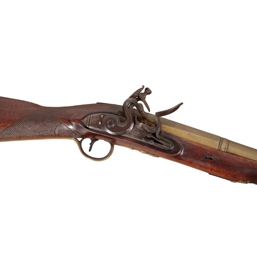 166 - JACKSON OF LONDON: AN EARLY 19TH CENTURY BLUNDERBUSS

with flintlock action, the walnut stock with c... 