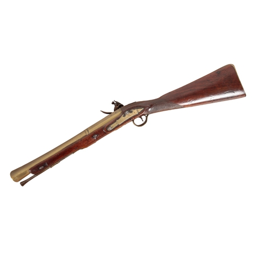 166 - JACKSON OF LONDON: AN EARLY 19TH CENTURY BLUNDERBUSS

with flintlock action, the walnut stock with c... 