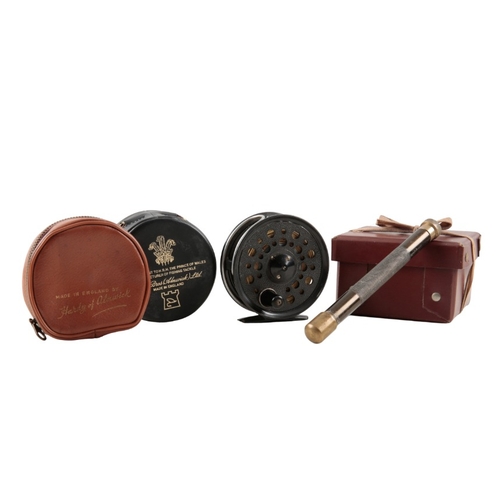 20 - HARDY: TWO REEL POUCHES

a brown cardboard reel box; a Shakespeare Pridex fly reel, in the original ... 