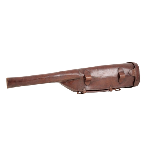 234 - A VICTORIAN BROWN LEATHER GUN CASE

with a leather carrying strap and carrying handle, 80cm long