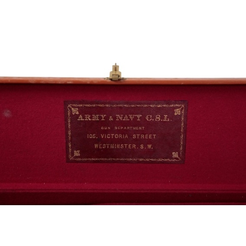 238 - ARMY & NAVY OF LONDON: A SINGLE BROWN LEATHER GUN CASE

with a beige fitted interior containing a pa... 