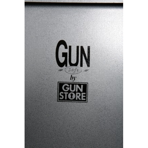 243 - A TALL GUN CABINET BY THE GUN STORE

for 6 guns, 29cm x 45cm