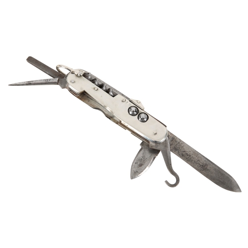 252 - J. NORTH, SHEFFIELD: A NICKEL SILVER AND STEEL POACHERS MULTI-TOOL KNIFE

with ten various attachmen... 