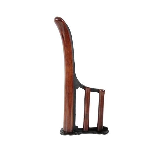 278 - MUSGRAVE, BELFAST: A MAHOGANY AND CAST IRON SIDE-SADDLE WALL RACK

63cm long