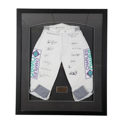 326 - CHELTENHAM GOLD CUP 2008: TWO PAIRS OF SIGNED JOCKEY PANTS

one worn by Gold Cup winner Sam Thomas r... 