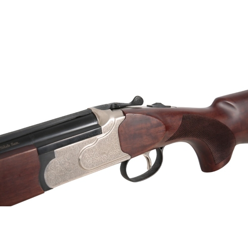 94 - *REVO 20 BORE O/U SHOTGUN

with synthetic walnut stock and forend, single trigger, floral engraved a... 