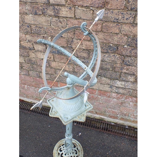 6 - AN ARMILLARY SPHERE SUNDIAL on cast iron stand 121cm high