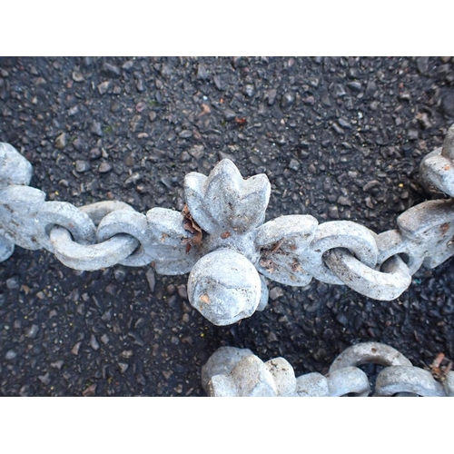 8 - A VICTORIAN ARCHITECTURAL CHAIN AND TWO STANCHIONS galvanised iron, the chain links of floral form, ... 