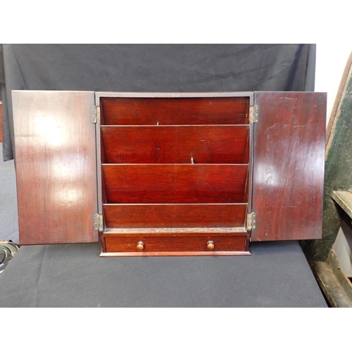 124 - AN EDWARDIAN MAHOGANY STATIONERY BOX with sloping doors over fitted interior, and drawer under, 38cm... 