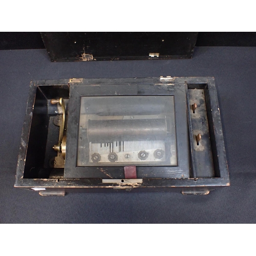 130 - A 19TH CENTURY CYLINDER MUSIC BOX with 15.5cm cylinder contained in grained case 15cm high, 38.5cm w... 