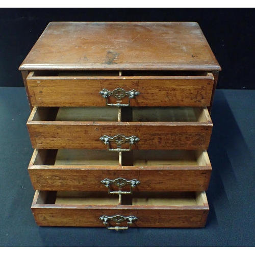 133 - A VICTORIAN MAHOGANY COLLECTOR'S CHEST fitted four drawers, 31cm high x 40cm wide x 26cm deep