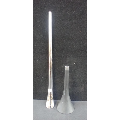 225 - A GEORG JENSEN SHOE HORN 'VOYAGER' on doorstop stand (missing top strap)