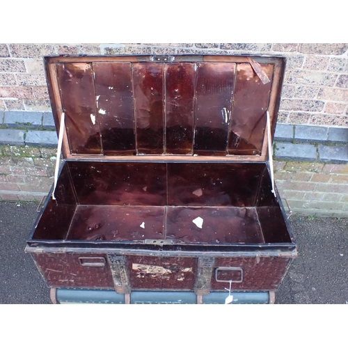 152 - A TIN TRAVELLING TRUNK, AND A CANVAS TRUNK 92cm and 94cm wide (2)